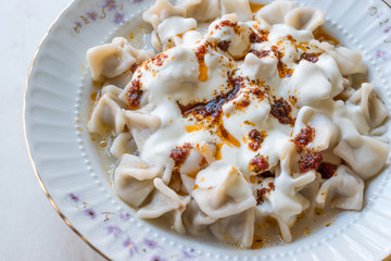 Turkish Manti Manlama / Ravioli with yogurt and fried butter sauce.