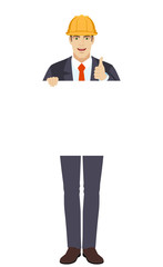 Businessman holding white blank poster and showing thumb up