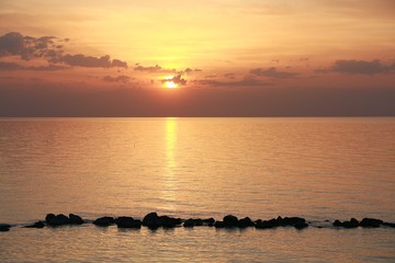 The color of sunrise on the sea.