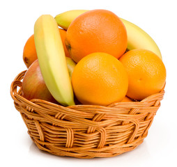 citrus fruits in basket isolated on white