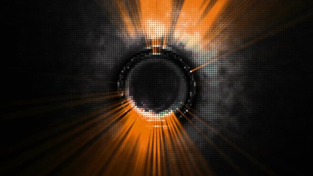 Orange rays of light rotating in a dark background