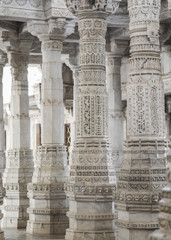 Fototapeta premium Ancient Architectural Ornament, Stone Carving Decorations Inside Ranakpur Jain Temple in Rajasthan, India
