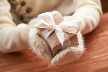 hands holding craft gift box