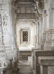 Fototapeta premium Ancient Architectural Ornament, Stone Carving Decorations Inside Ranakpur Jain Temple in Rajasthan, India