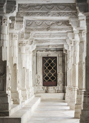 Fototapeta premium Ancient Architectural Ornament, Stone Carving Decorations Inside Ranakpur Jain Temple in Rajasthan, India
