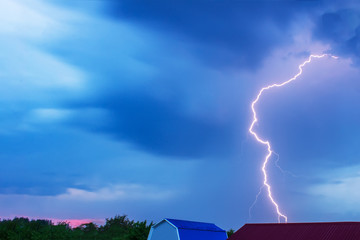Summer storm bringing thunder, lightnings and rain.
