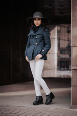 Fashionable girl in coat