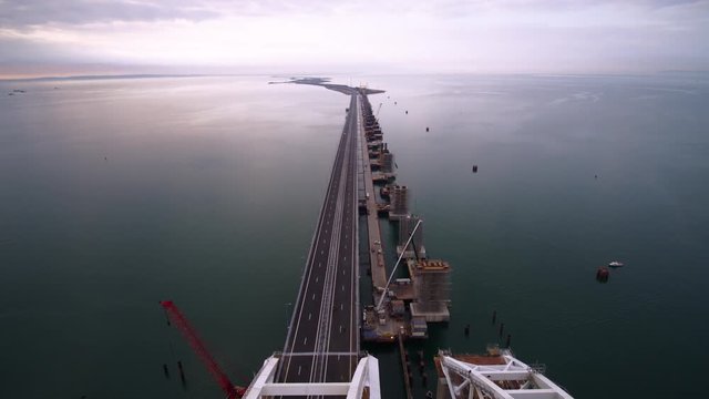 KERCH, RUSSIA, May 16, 2018: Aerial view of The Crimean Bridge, Kerch Bridge, colloquially the Kerch Strait Bridge with road and rail passages across the Kerch Strait, which will connect the Taman