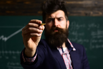 International student making individual online testing. Tutor helps the student build self-confidence. Professor and school student at the classroom in a school. planning.