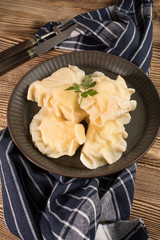 Appetizing traditional East Europe dumplings (pierogi) with cheese.