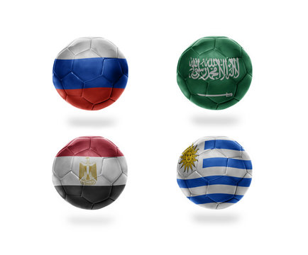 soccer team group A. football balls with national flags of russia, saudi arabia, egypt, uruguay