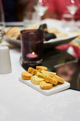 Assortment flavored aromatic butter on breakfast table, close-up