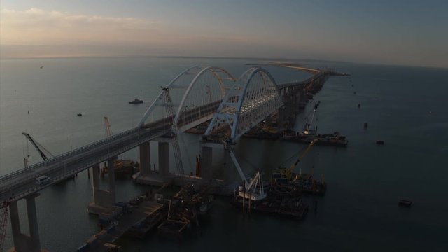 KERCH, RUSSIA, May 16, 2018: Aerial view of The Crimean Bridge, Kerch Bridge, colloquially the Kerch Strait Bridge with road and rail passages across the Kerch Strait, which will connect the Taman