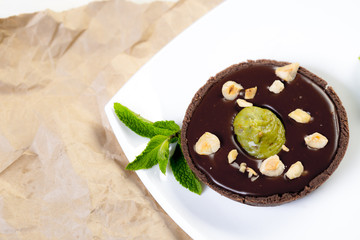 chocolate tart with pistachio and and hazelnut