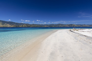 A white sand beach in the tropical Seventeen Island National Park, Indonesia.
