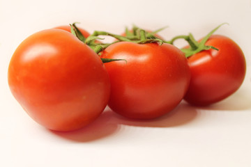 red tomatoes background. Group of tomatoes