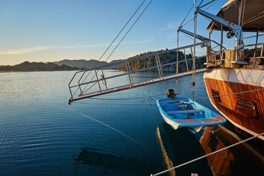 port of Kekova with moored yachts during sunset, Turkey