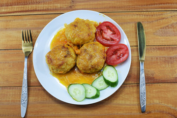 lunch, sauce with meat cutlets and with fresh tomatoes and cucumbers