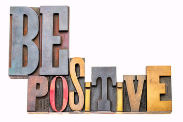 Be positive word abstract in wood type