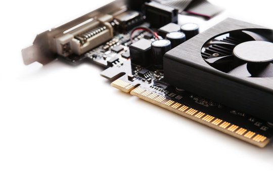 Computer graphic card on white background. Connectors, video signal terminals. Shallow depth of field, macro shot.