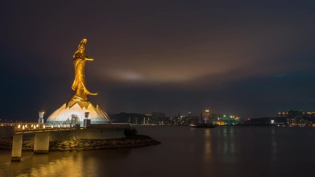 night illuminated macau city famous golden statue panorama 4k timelapse china
