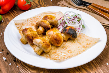 Skewers of mushrooms