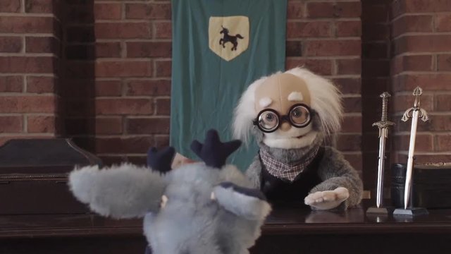 Two family-friendly puppets talk to each other.