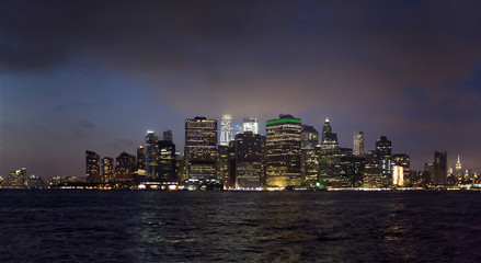 Fototapeta na wymiar Manhattan buildings viewed from Brooklyn side and East river New York