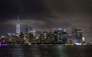Fototapeta na wymiar Manhattan buildings viewed from Brooklyn side and East river New York