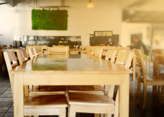 Table at cafeteria with blurred background of people 