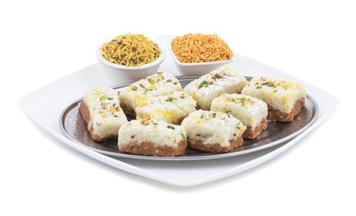Indian Diwali Sweet Food Kalakand Also Know as Halwa or Mawa Kalakand is a Creamy Delicacy Made From Paneer or Cottage Cheese, The Dish Originated in Alwar, Rajasthan. Isolated on White Background