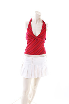 Red top and white mini skirt on mannequin full body shop display. Woman fashion styles, clothes on white studio background.