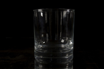 Empty glass on a black background