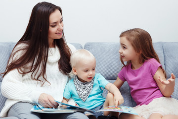 Mother playing with children