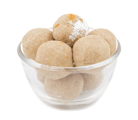 Fototapeta na wymiar Gehu Ke Laddu Indian Traditional Sweet Food Also Know as Wheat Laddu, Laddoos, laddoo, ladoo, laddo Are Ball-Shaped Sweets Popular in The Indian Festivals. isolated on White Background