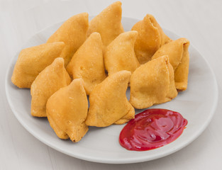 Samosa with Sweet Red Chutney Indian Delicious Deep Fried Breakfast