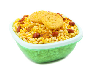 Indian Street Spicy Food Bhel puri is a savoury snack, and is also a type of chaat. It is made of puffed rice, vegetables and a tangy tamarind sauce. isolated on white background