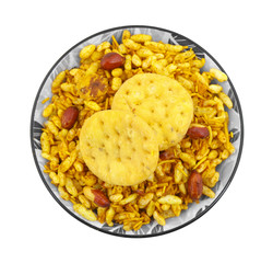 Indian Street Spicy Food Bhel puri is a savoury snack, and is also a type of chaat. It is made of puffed rice, vegetables and a tangy tamarind sauce. isolated on white background