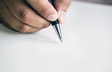 Hand write on the notebook