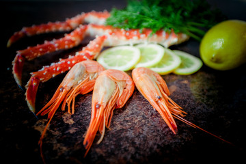 Crab legs on  rustic background
