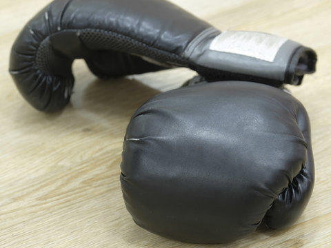 The image of boxing gloves close up