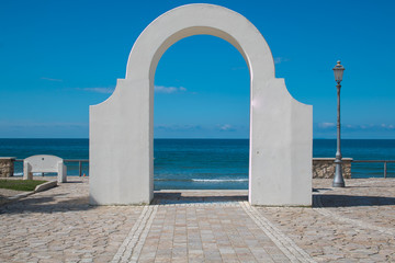 Arco per entrare nel mare Tirreno a Sperlonga, latina, lazio, Italia - obrazy, fototapety, plakaty