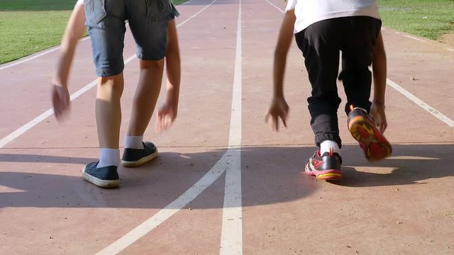 Boy play racing run in school - child school fun run sport activity concept