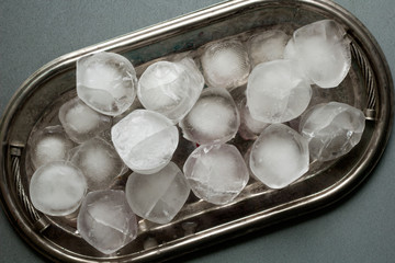 Fototapeta na wymiar top view vintage silver tray with ice