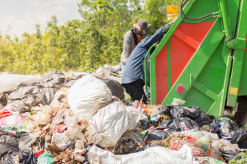 People are taking garbage out of the ca, the concept of pollution and the environment,World Environment Day