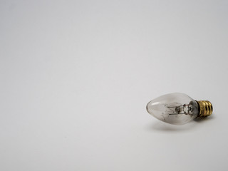 A light bulb on a white background, a place for text