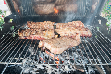 barbecue with ribs and steak