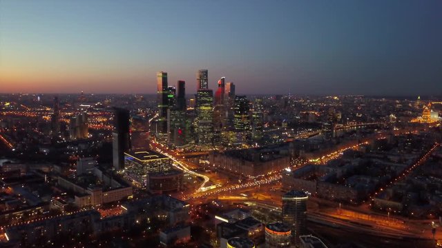 sunset sky moscow modern city traffic road ring junction aerial cityscape panorama 4k russia
