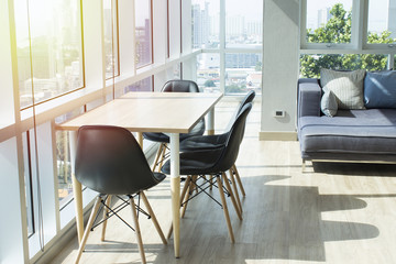 Luxurious penthouse real estate with modern trendy design and view of the ocean and city.