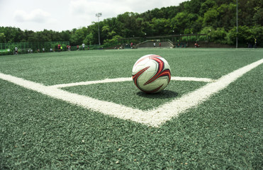 soccer Football on Corner kick line of ball and a soccer field